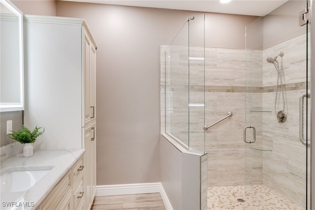 11991 Champions Green Way Unit 608, Fort Myers, FL 33913 - full bathroom with a shower stall, vanity, and baseboards