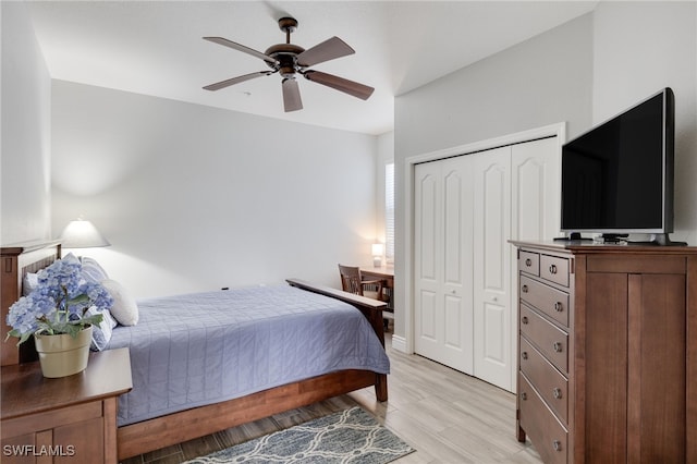 11991 Champions Green Way Unit 608, Fort Myers, FL 33913 - bedroom with light wood-style flooring, a closet, and a ceiling fan