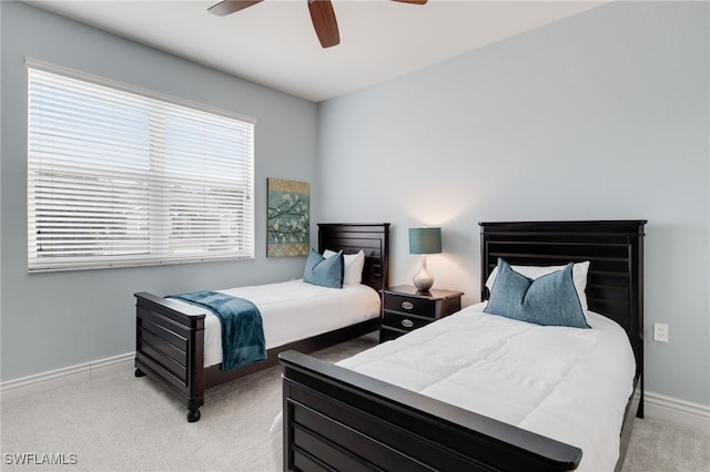 11991 Champions Green Way Unit 608, Fort Myers, FL 33913 - bedroom with light colored carpet, baseboards, and a ceiling fan