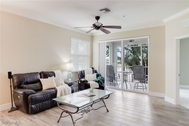 11991 Champions Green Way Unit 608, Fort Myers, FL 33913 - living room featuring a ceiling fan, crown molding, baseboards, and light wood-style flooring