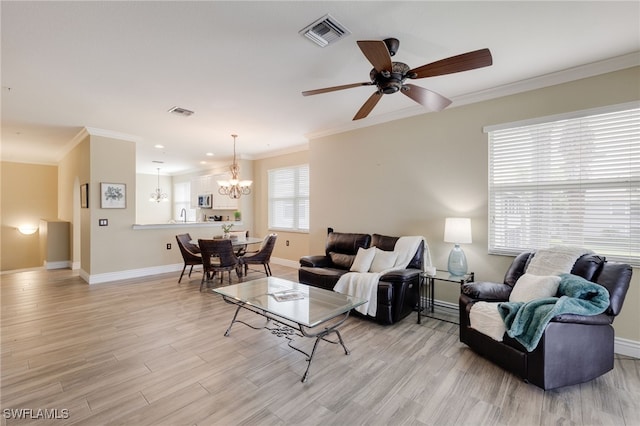 11991 Champions Green Way Unit 608, Fort Myers, FL 33913 - living room featuring a chandelier, crown molding, light wood-type flooring, baseboards, and ceiling fan
