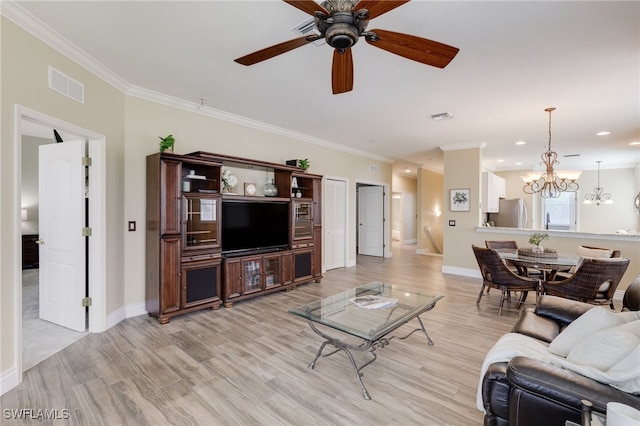 11991 Champions Green Way Unit 608, Fort Myers, FL 33913 - living area featuring a chandelier, ceiling fan, baseboards, light wood-style floors, and crown molding
