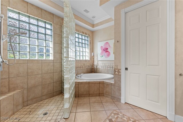 436 Chartwell Pl, Naples, FL 34110 - full bathroom with crown molding, a tile shower, tile patterned floors, visible vents, and a bath
