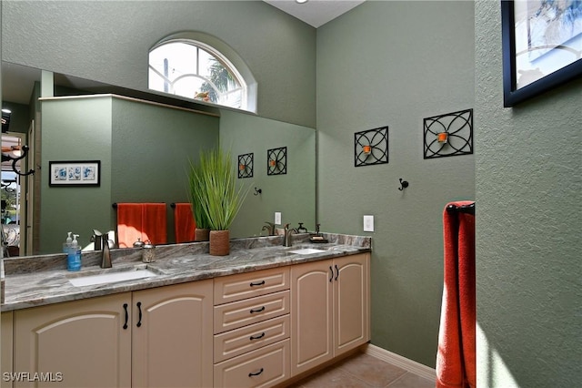 24342 Saragossa Ln, Punta Gorda, FL 33955 - bathroom featuring tile patterned floors, a sink, and double vanity