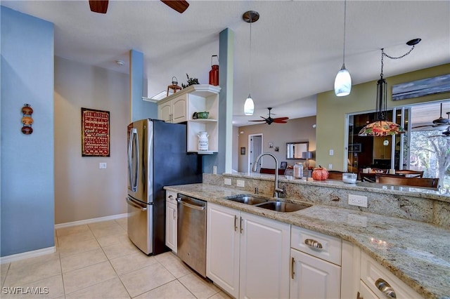 24342 Saragossa Ln, Punta Gorda, FL 33955 - kitchen with a sink, stainless steel appliances, decorative light fixtures, and ceiling fan
