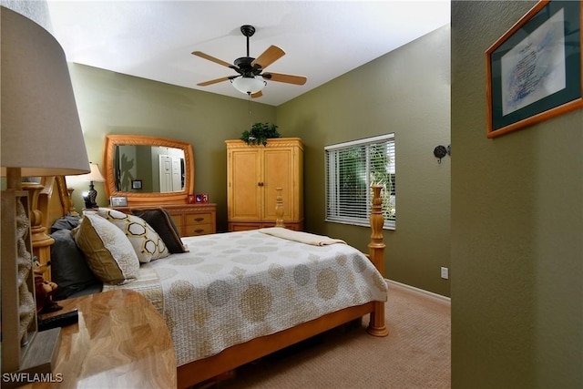 24342 Saragossa Ln, Punta Gorda, FL 33955 - bedroom featuring baseboards, vaulted ceiling, ceiling fan, and carpet floors