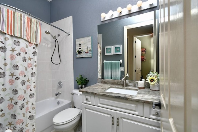 24342 Saragossa Ln, Punta Gorda, FL 33955 - bathroom with toilet, shower / bath combo with shower curtain, and vanity