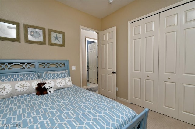 24342 Saragossa Ln, Punta Gorda, FL 33955 - bedroom with light carpet and a closet