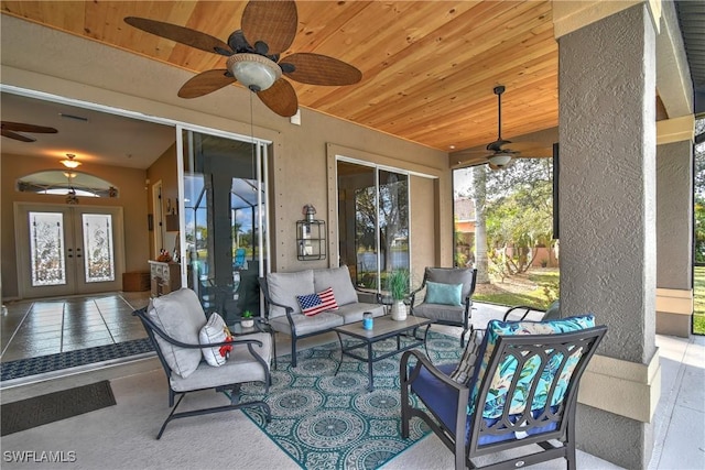 24342 Saragossa Ln, Punta Gorda, FL 33955 - view of patio featuring outdoor lounge area, visible vents, ceiling fan, and french doors
