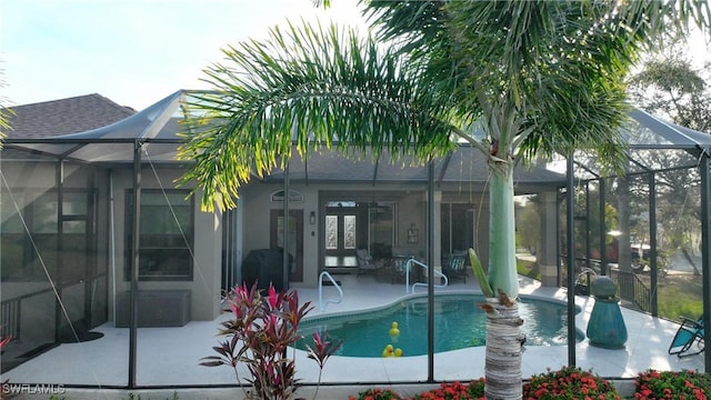 24342 Saragossa Ln, Punta Gorda, FL 33955 - outdoor pool featuring a lanai and a patio