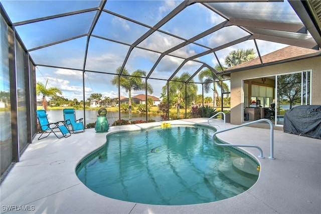 24342 Saragossa Ln, Punta Gorda, FL 33955 - pool featuring a water view, glass enclosure, and a patio