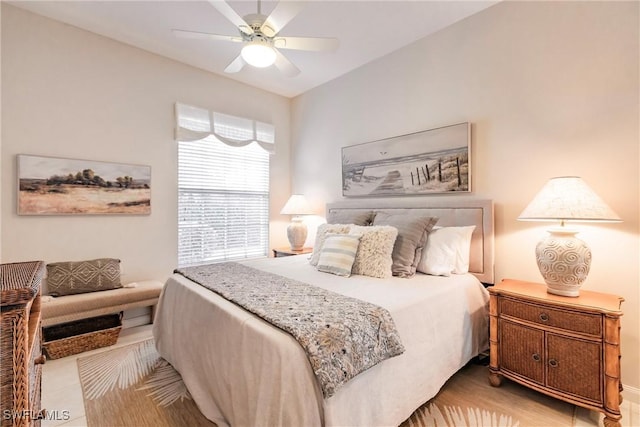 bedroom featuring baseboards and a ceiling fan