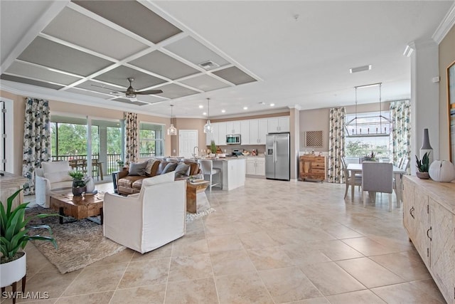 14600 Sycamore Ct Unit 2022, Punta Gorda, FL 33955 - living room with ornamental molding, ceiling fan, recessed lighting, coffered ceiling, and a chandelier