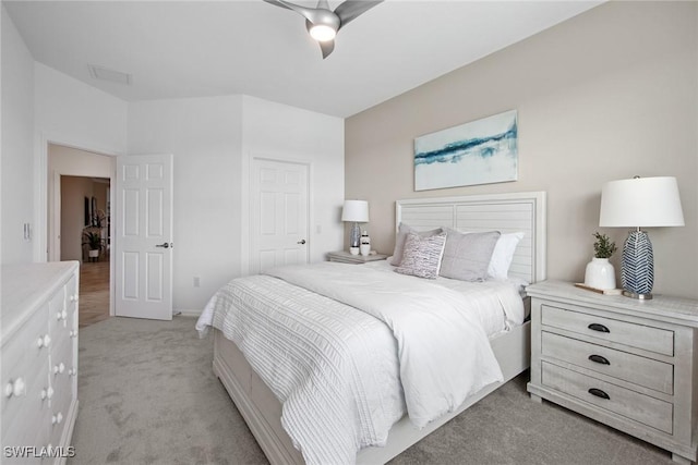 14600 Sycamore Ct Unit 2022, Punta Gorda, FL 33955 - bedroom with light carpet, a closet, and ceiling fan
