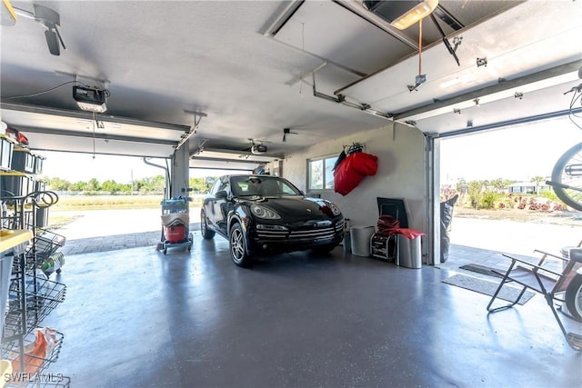 garage featuring a garage door opener