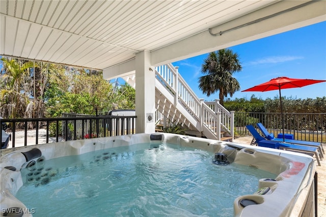 5773 Sanibel Captiva Rd, Sanibel, FL 33957 - view of pool featuring stairs and a hot tub