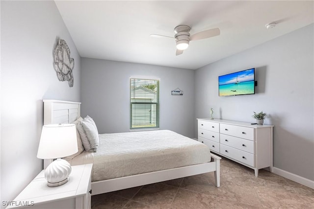 3801 SW 1st Ln, Cape Coral, FL 33991 - bedroom with baseboards and a ceiling fan