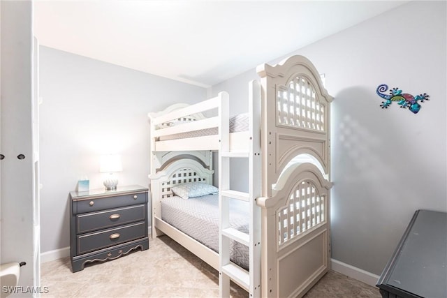 3801 SW 1st Ln, Cape Coral, FL 33991 - bedroom featuring baseboards