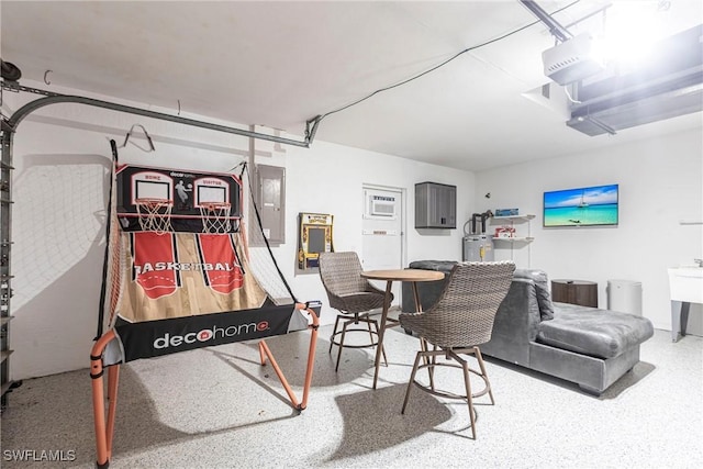 3801 SW 1st Ln, Cape Coral, FL 33991 - interior space with a garage, water heater, and electric panel