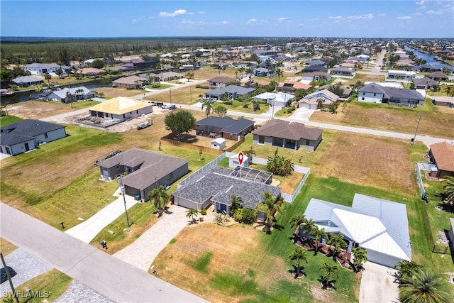 3801 SW 1st Ln, Cape Coral, FL 33991 - drone / aerial view featuring a residential view