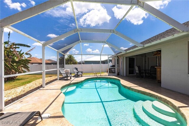 3801 SW 1st Ln, Cape Coral, FL 33991 - view of swimming pool with a patio, a lanai, fence, and a fenced in pool