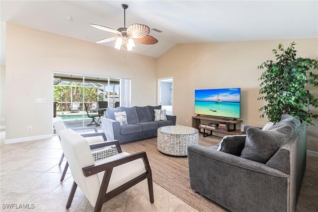 3801 SW 1st Ln, Cape Coral, FL 33991 - living area with a ceiling fan, baseboards, light tile patterned floors, vaulted ceiling, and visible vents