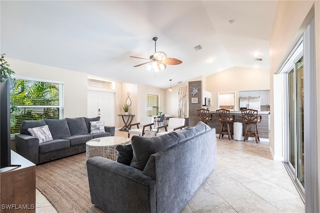 3801 SW 1st Ln, Cape Coral, FL 33991 - living room featuring a ceiling fan, visible vents, light tile patterned floors, and lofted ceiling