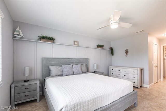 3801 SW 1st Ln, Cape Coral, FL 33991 - bedroom with visible vents, a ceiling fan, and baseboards