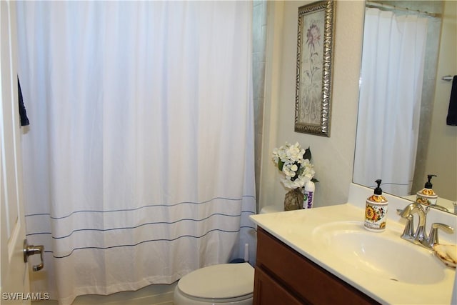14768 Cranberry Ct, Naples, FL 34114 - bathroom featuring toilet, vanity, and a shower with curtain
