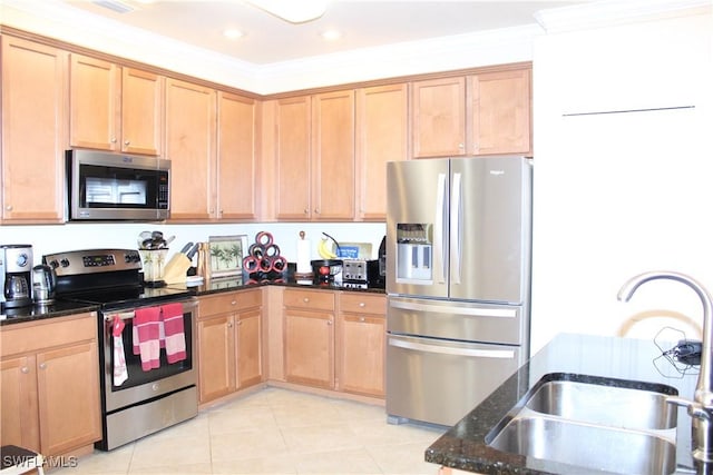 14768 Cranberry Ct, Naples, FL 34114 - kitchen with recessed lighting, light tile patterned floors, dark stone counters, appliances with stainless steel finishes, and a sink