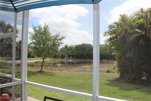 14768 Cranberry Ct, Naples, FL 34114 - unfurnished sunroom with a water view