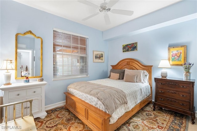 10520 Amiata Way Unit 104, Fort Myers, FL 33913 - bedroom with baseboards and a ceiling fan