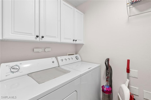10520 Amiata Way Unit 104, Fort Myers, FL 33913 - laundry area with washing machine and dryer and cabinet space