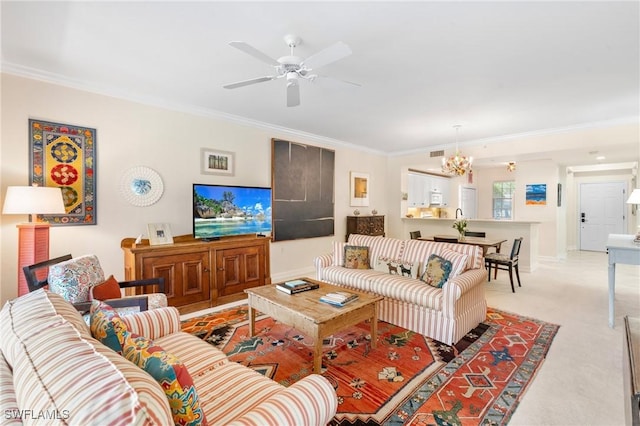 10520 Amiata Way Unit 104, Fort Myers, FL 33913 - living room featuring ornamental molding, a chandelier, a ceiling fan, and light carpet