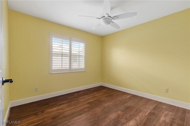 2020 Aruba Ave, Fort Myers, FL 33905 - unfurnished room featuring dark wood-style flooring, baseboards, and a ceiling fan