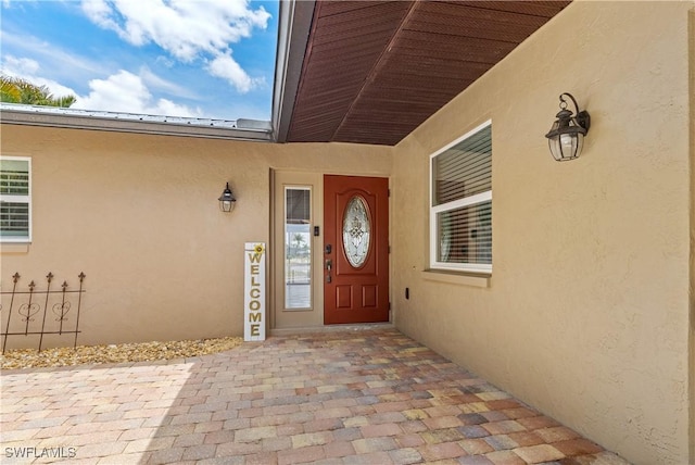 2020 Aruba Ave, Fort Myers, FL 33905 - view of exterior entry featuring stucco siding