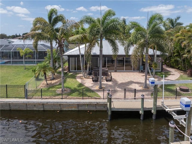 2020 Aruba Ave, Fort Myers, FL 33905 - dock area with a water view and a patio