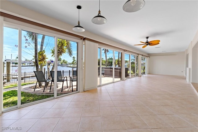 2020 Aruba Ave, Fort Myers, FL 33905 - unfurnished sunroom with healthy amount of natural light and a water view