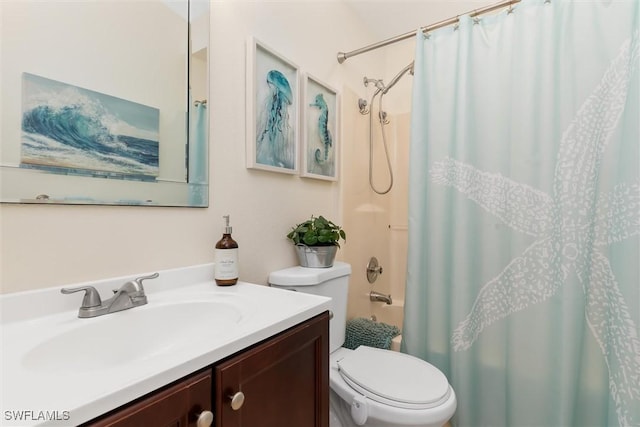 full bathroom featuring shower / bath combination with curtain, toilet, and vanity