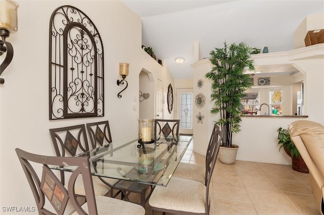 tiled dining area with arched walkways