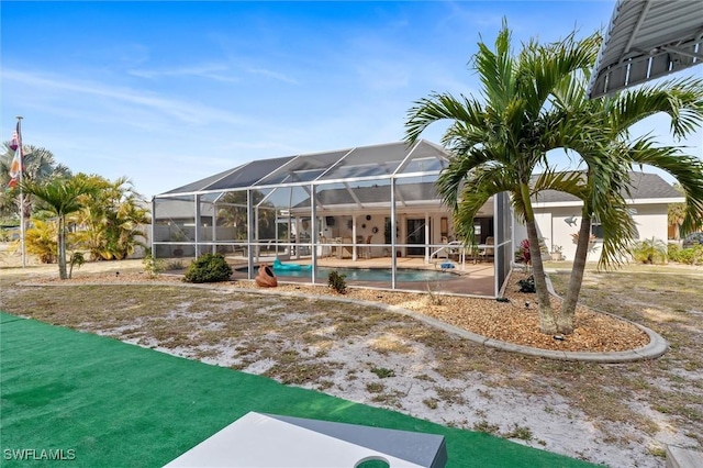 exterior space featuring a swimming pool and a patio