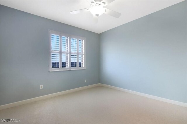 11600 Court Of Palms Unit 506, Fort Myers, FL 33908 - unfurnished room featuring ceiling fan, carpet floors, and baseboards