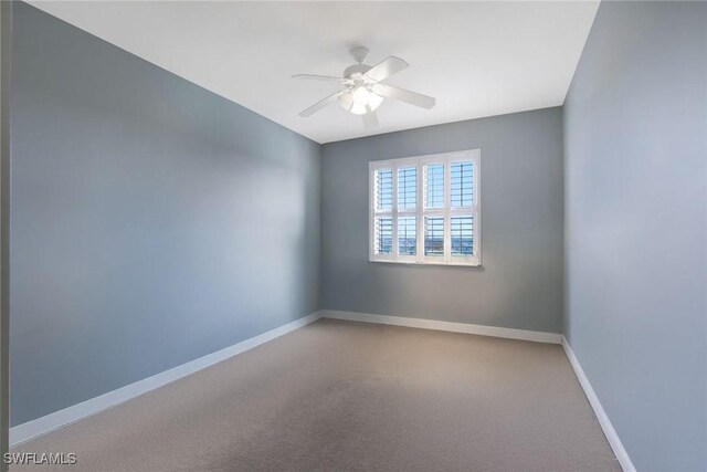 11600 Court Of Palms Unit 506, Fort Myers, FL 33908 - carpeted empty room featuring ceiling fan and baseboards