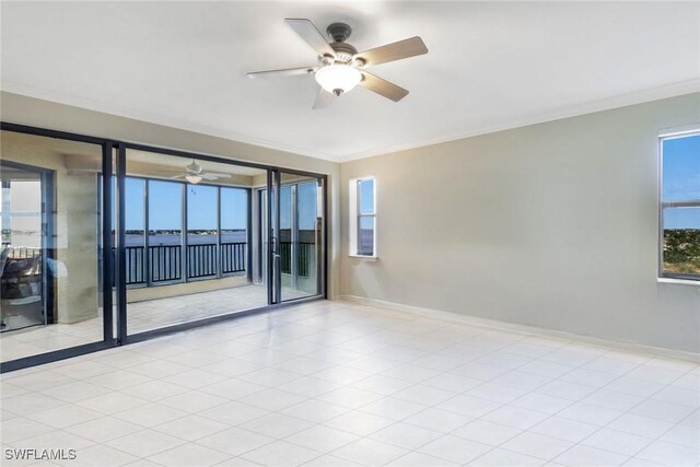 11600 Court Of Palms Unit 506, Fort Myers, FL 33908 - empty room featuring ceiling fan, crown molding, and baseboards