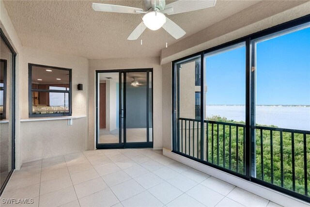 11600 Court Of Palms Unit 506, Fort Myers, FL 33908 - unfurnished sunroom with a water view