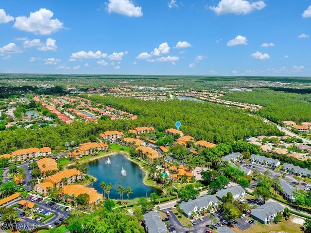 1180 Wildwood Lakes Blvd Unit 207, Naples, FL 34104 - bird's eye view with a water view and a residential view