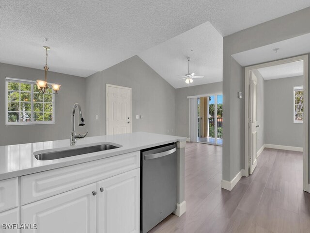 1180 Wildwood Lakes Blvd Unit 207, Naples, FL 34104 - kitchen with dishwasher, a sink, and a healthy amount of sunlight
