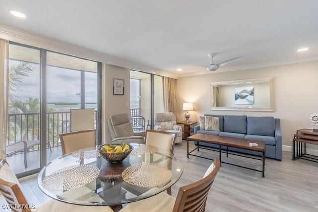 10 Tampa Pl Unit 401, Marco Island, FL 34145 - dining room featuring recessed lighting, light wood-style flooring, baseboards, and crown molding