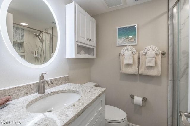 10 Tampa Pl Unit 401, Marco Island, FL 34145 - full bathroom with toilet, vanity, a marble finish shower, and visible vents