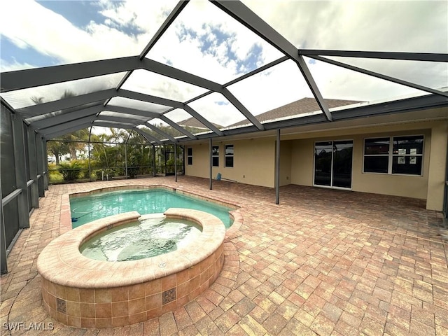8091 Allamanda Ct, Lehigh Acres, FL 33972 - view of pool with a pool with connected hot tub and a patio area